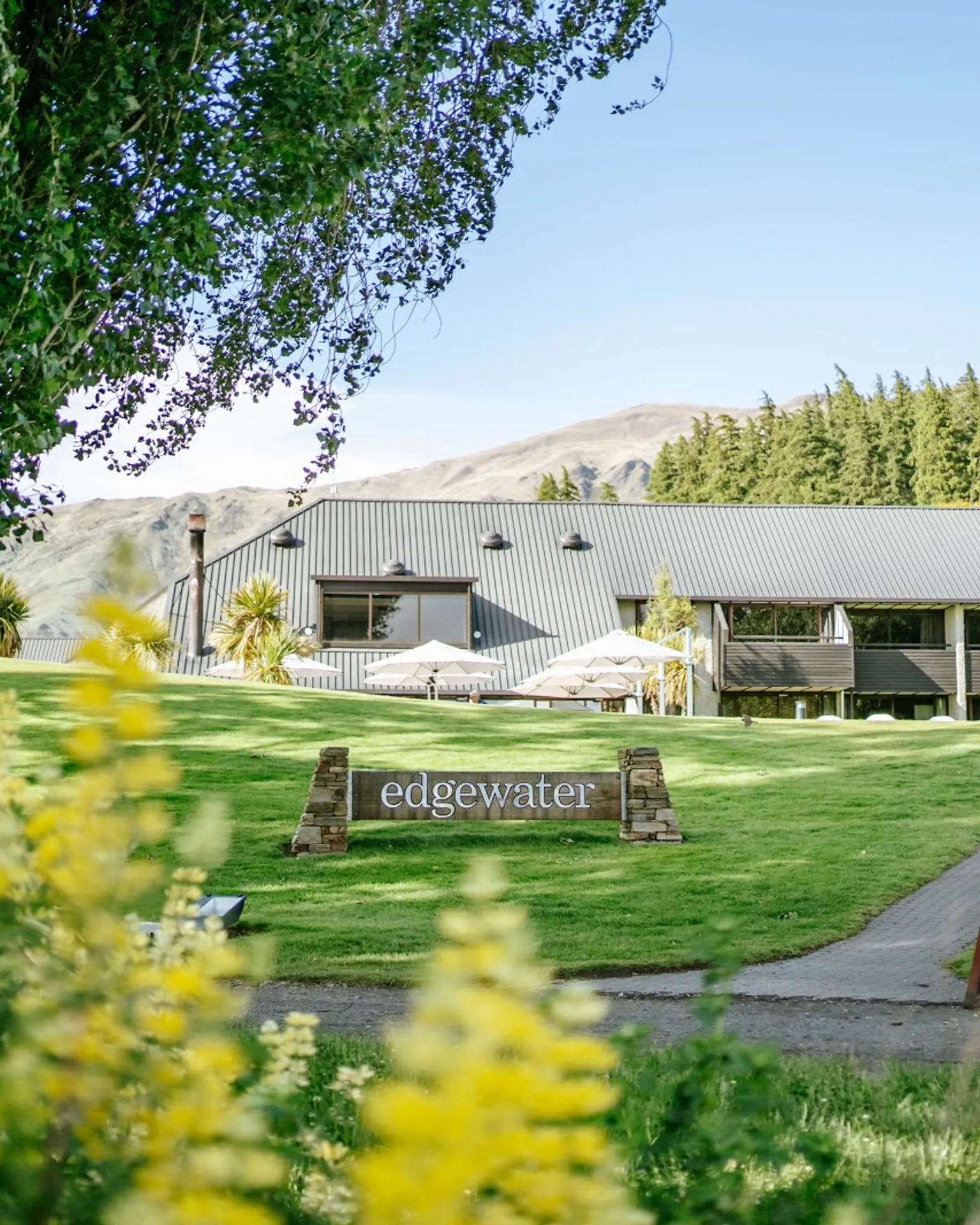 Edgewater resort grounds and signage at Lake Wānaka